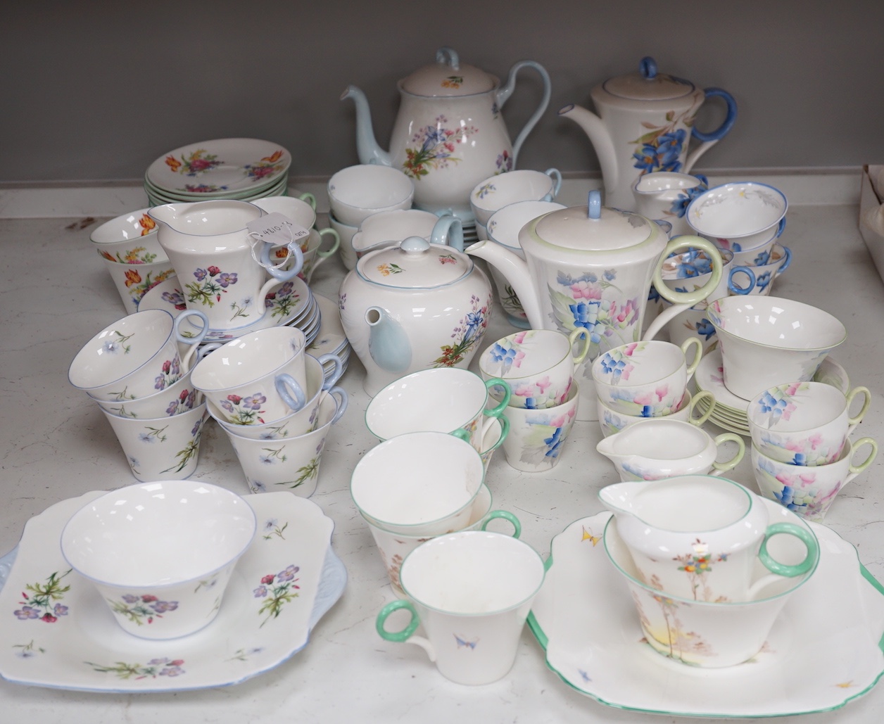 Large quantity of Shelley tea wares to include Syringo 12025, Wild Flowers 2823, Hydrangea 12318, WR 078 and Wild Flowers 13668